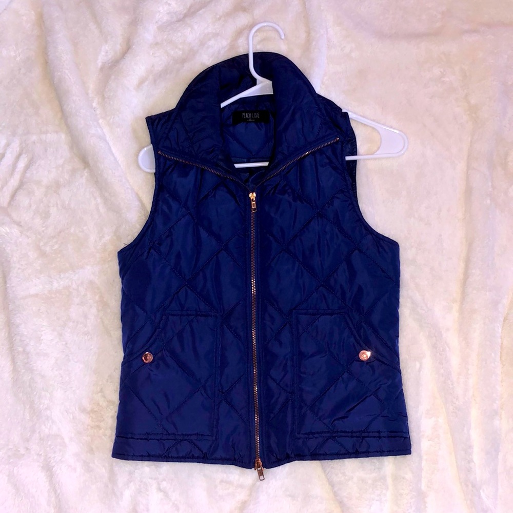 Navy puffy vest, slightly used